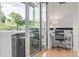 A cozy office space leading to a private balcony with a relaxing hot tub and treetop views at 2758 W 22Nd Ave, Denver, CO 80211