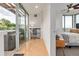 Bright office nook with modern desk and shelving, adjacent to a bedroom with seamless access to an outdoor hot tub at 2758 W 22Nd Ave, Denver, CO 80211