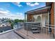 Enjoy city views from this rooftop deck with a private hot tub and modern pergola, perfect for relaxing or entertaining at 2758 W 22Nd Ave, Denver, CO 80211