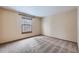 Bright bedroom with carpet flooring and a window at 223 Durham Ct, Castle Pines, CO 80108