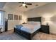 Modern bedroom with soft carpet, bed, and wall art at 10197 Crest View Dr, Morrison, CO 80465