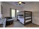 Cozy bedroom features a bunk bed and a comfy papasan chair at 10197 Crest View Dr, Morrison, CO 80465