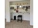Cozy nook offering a functional home office space, complete with built-in desk, shelving and stool at 10197 Crest View Dr, Morrison, CO 80465