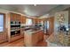 Spacious kitchen with stainless steel appliances and granite countertops at 10197 Crest View Dr, Morrison, CO 80465