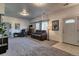 Cozy living room featuring plush furniture, and a decorative fireplace adding warmth to the space at 10197 Crest View Dr, Morrison, CO 80465