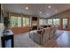 Cozy living room with a fireplace and beautiful views of the surrounding landscape at 10197 Crest View Dr, Morrison, CO 80465