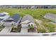 An aerial view of a well-maintained home with a two car garage, landscaping, and a charming front porch at 2060 Peralta Loop, Castle Rock, CO 80104