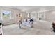 Spacious finished basement with plenty of room for lounging and windows that bring in natural light at 2060 Peralta Loop, Castle Rock, CO 80104