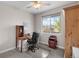 Cozy bedroom with a ceiling fan, a bright window, and a desk area suitable for a home office setup at 2060 Peralta Loop, Castle Rock, CO 80104