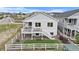 Two-story house with a fenced yard and a spacious deck at 2060 Peralta Loop, Castle Rock, CO 80104