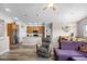 Bright open-concept living space seamlessly connects the kitchen, dining area, and living room at 2060 Peralta Loop, Castle Rock, CO 80104