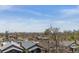 A view of the neighborhood from rooftop offers scenic views and an insight into the community at 2900 W 44Th Ave # 301, Denver, CO 80211