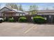 Assigned parking spaces behind the building and a wooden fence, providing convenient and secure parking at 2900 W 44Th Ave # 301, Denver, CO 80211