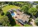Expansive estate with private pool, outdoor patio, and lush landscaping on a sprawling lot at 3500 S Franklin St, Englewood, CO 80113