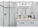 Modern bathroom with a large vanity and glass shower at 3500 S Franklin St, Englewood, CO 80113