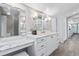 Bathroom with marble countertops and double vanity at 3500 S Franklin St, Englewood, CO 80113