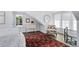 Serene bedroom with unique area rug and spiral staircase at 3500 S Franklin St, Englewood, CO 80113
