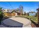 Backyard featuring a custom stone patio at 3345 W Clyde Pl, Denver, CO 80211