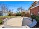 Charming backyard featuring a spacious round patio, perfect for entertaining guests outdoors at 3345 W Clyde Pl, Denver, CO 80211