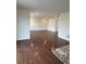 Open concept living room with hardwood floors and recessed lighting at 10611 Casper St, Parker, CO 80134