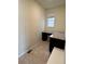 Dedicated office space with a built-in desk, granite counters, and natural light at 10611 Casper St, Parker, CO 80134