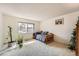Sunlit bedroom with a daybed at 12407 E Louisiana Ave, Aurora, CO 80012