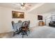 The dining room shows a table with chairs and an adjacent living area at 12407 E Louisiana Ave, Aurora, CO 80012