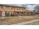 Charming townhome with a well-maintained front yard and inviting entrance, perfect for first-time homebuyers at 12407 E Louisiana Ave, Aurora, CO 80012