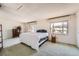 Large bedroom with natural light and views to the outside at 12407 E Louisiana Ave, Aurora, CO 80012