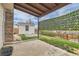 View of patio and backyard featuring a privacy screen and storage shed at 18843 E Colorado Dr, Aurora, CO 80017