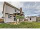 Spacious backyard with a patio, lawn, shed, and privacy screen, perfect for outdoor activities at 18843 E Colorado Dr, Aurora, CO 80017