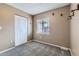 Bedroom featuring carpeted floors, a window for natural light, and a closet at 18843 E Colorado Dr, Aurora, CO 80017