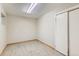 Bonus room features light colored walls, wood look floors, a closet, and a small window for natural light at 18843 E Colorado Dr, Aurora, CO 80017