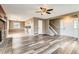 View of entry, staircase, and dining room with tile floors from living room at 18843 E Colorado Dr, Aurora, CO 80017