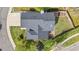 Aerial view showcasing the home's roof, landscaping, driveway, and proximity to the street at 3055 E 133Rd Cir, Thornton, CO 80241