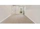 Basement hallway with carpet flooring leads to a bathroom and additional rooms at 3055 E 133Rd Cir, Thornton, CO 80241