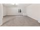 Spacious finished basement with carpet flooring, neutral paint, and a window at 3055 E 133Rd Cir, Thornton, CO 80241