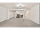 Finished basement space features neutral walls, carpet flooring, and a stairway at 3055 E 133Rd Cir, Thornton, CO 80241