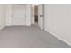 Empty carpeted bedroom with a closet and entryway to another room at 3055 E 133Rd Cir, Thornton, CO 80241