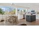 Bright, modern kitchen with a breakfast nook, stainless steel appliances, and ample counter space at 3055 E 133Rd Cir, Thornton, CO 80241