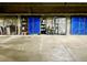 Garage area featuring secure storage units for residents, enhancing organization and convenience at 10111 Inverness Main St # 228, Englewood, CO 80112