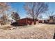 There is a fire pit in the backyard of the brick home at 2921 E Colorado Ave, Denver, CO 80210