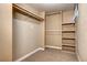 Walk-in closet featuring carpeted floor and shelving/storage at 2921 E Colorado Ave, Denver, CO 80210