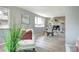 Cozy dining area featuring stylish chairs, modern accents, and a stone fireplace at 2921 E Colorado Ave, Denver, CO 80210