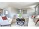 Elegant living room with stylish decor, new flooring, and plenty of natural light at 2921 E Colorado Ave, Denver, CO 80210