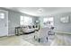 Inviting living room with neutral paint, large windows, and modern decor accents at 2921 E Colorado Ave, Denver, CO 80210