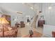 Open-concept living area with a staircase and view of the upper level at 7888 Canvasback Cir, Littleton, CO 80125