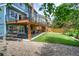 Inviting backyard featuring a spacious deck, well-maintained lawn, and cozy seating area for outdoor relaxation at 8140 S Storm King Peak, Littleton, CO 80127