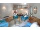Inviting living room with loft, hardwood floors, plush seating, and modern decor at 8140 S Storm King Peak, Littleton, CO 80127