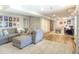 Spacious living room with an oversized couch and decor at 8140 S Storm King Peak, Littleton, CO 80127